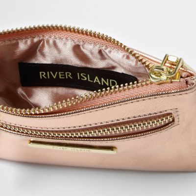 Rose gold tone zip front purse
